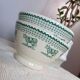 Duo of “daisy” cow decor bowls by Geneviève Lethu, 1996