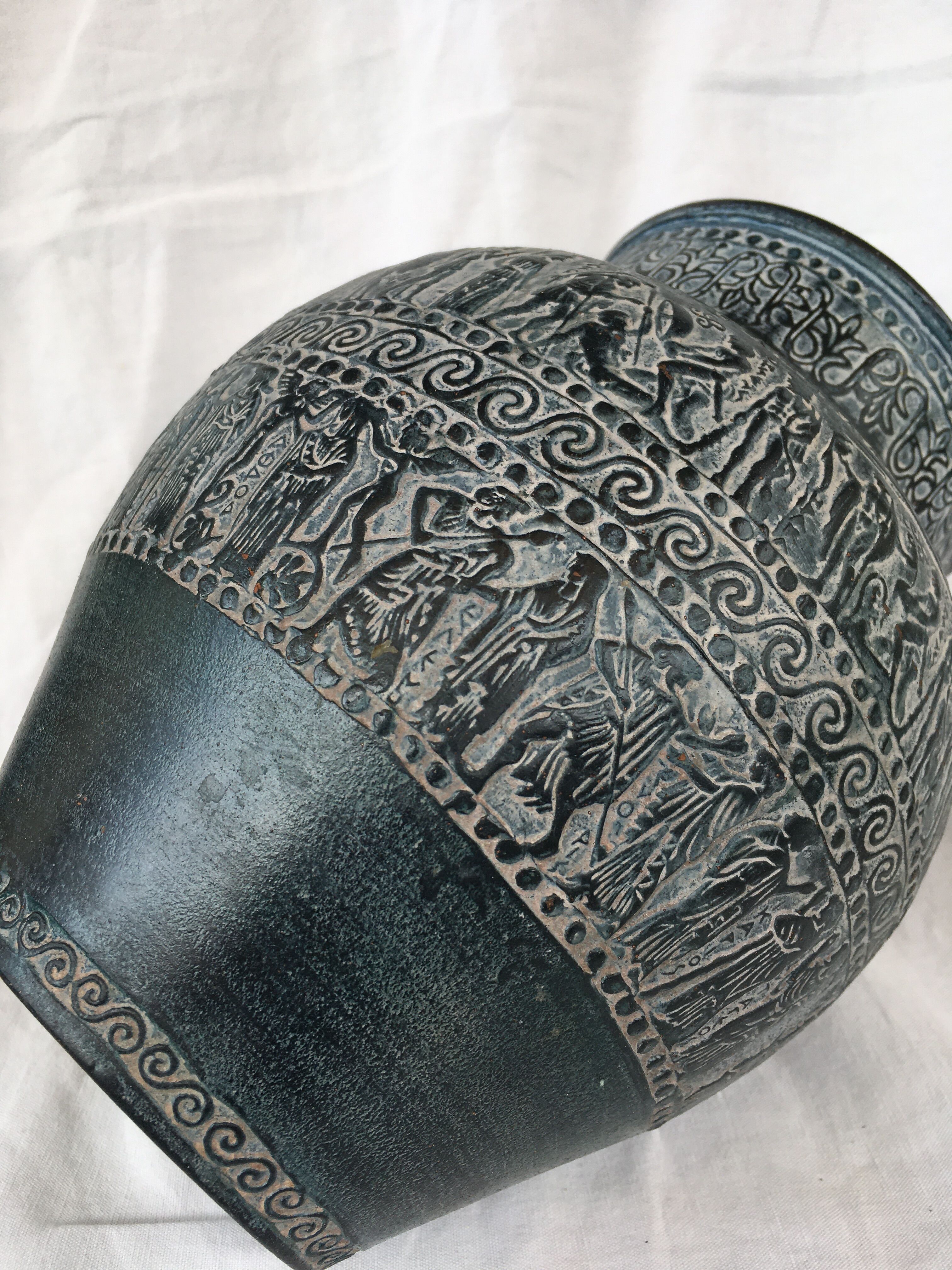 Vase decorated with friezes of ancient inspiration.