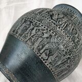 Vase decorated with friezes of ancient inspiration.
