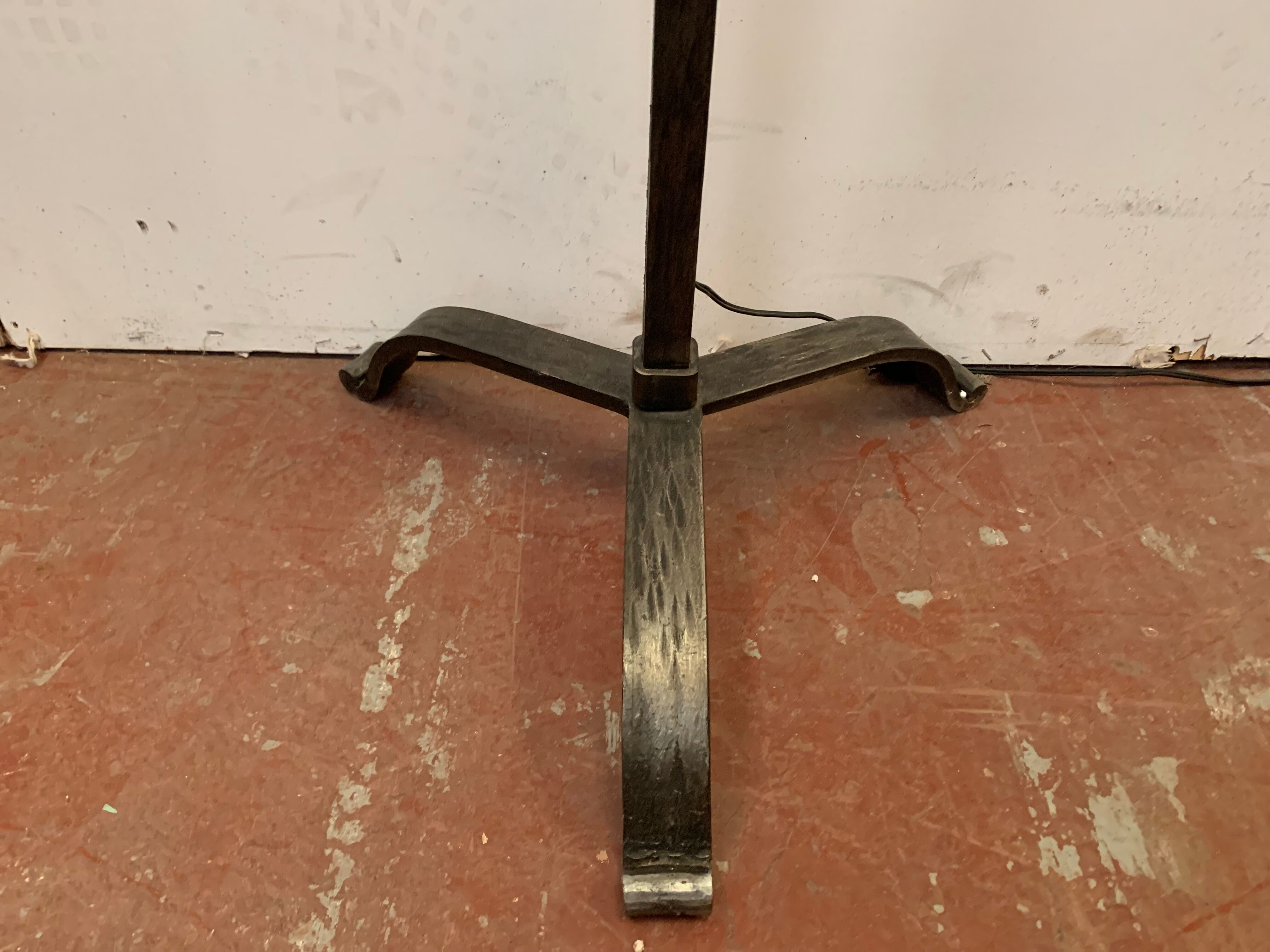 Floor lamp has four wrought iron lights