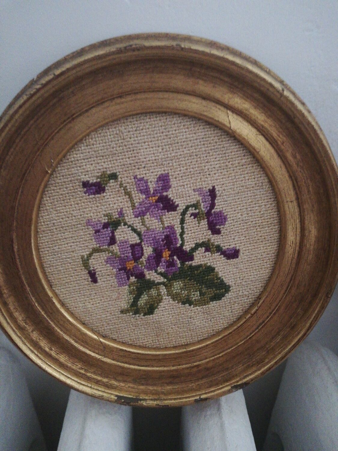 Pair of miniature gold round frames