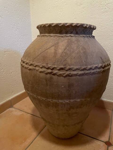 Ancient terracotta pottery jar