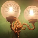 Pair of large double-light wall sconces in vintage brass and glass
