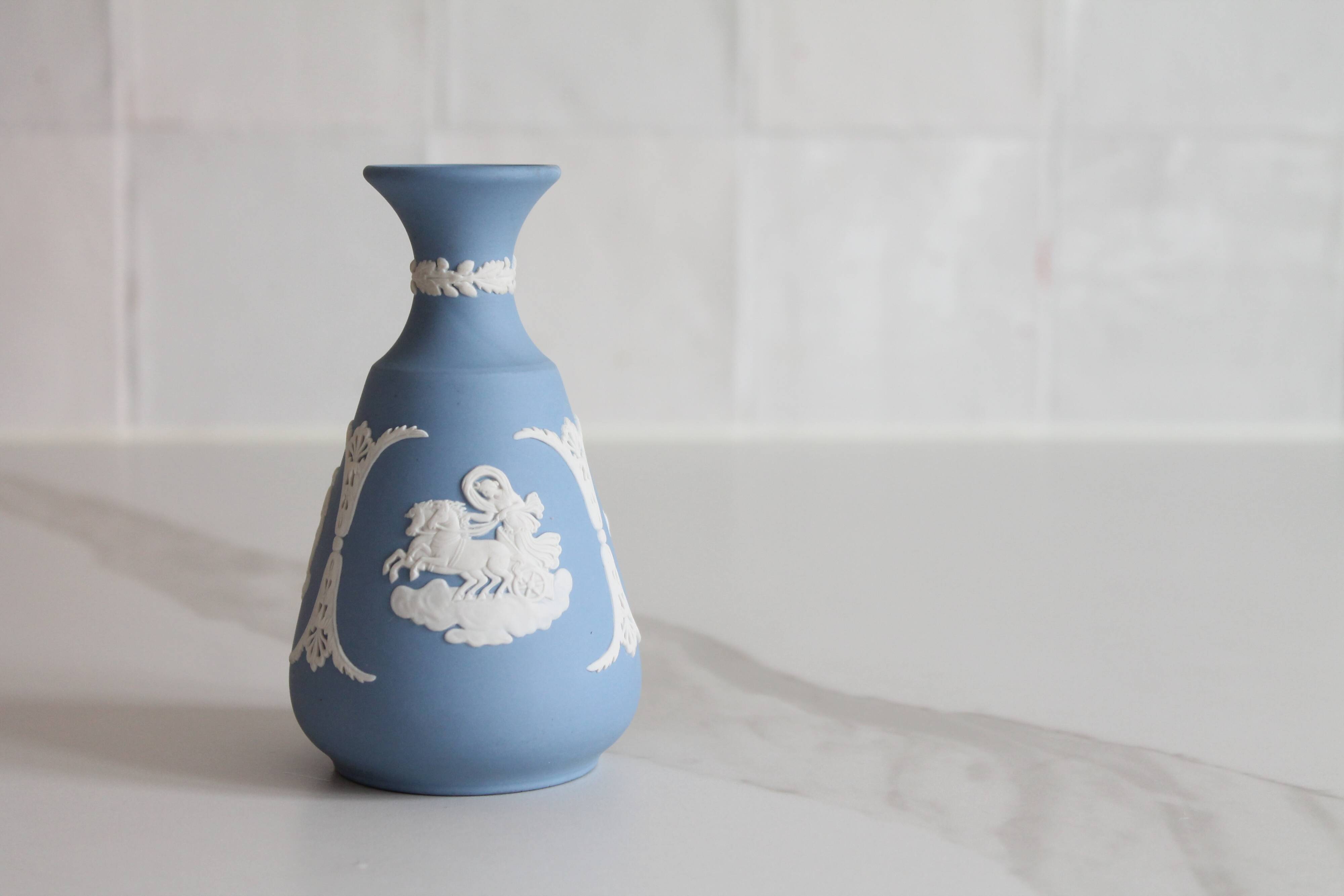 Blue porcelain vase by Wedgwood.