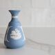 Blue porcelain vase by Wedgwood.