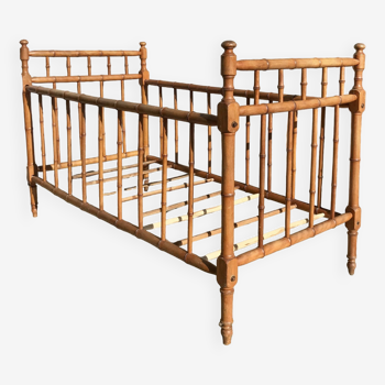Old wooden children's bed