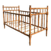 Old wooden children's bed