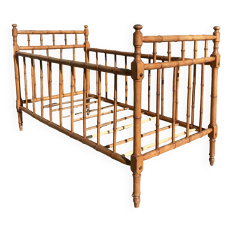 Old wooden children's bed