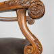 Louis XIII office armchair in leather and walnut carved around 1860