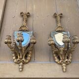 Pair of carved wood sconces
