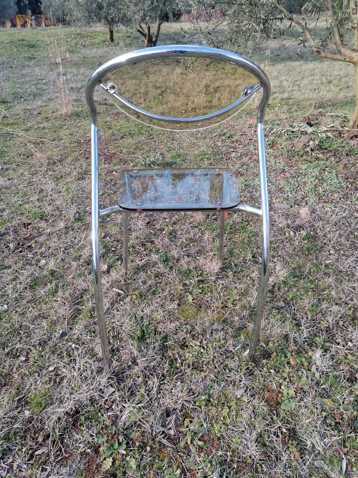 Vintage designer chair in plexiglass and chrome 1980