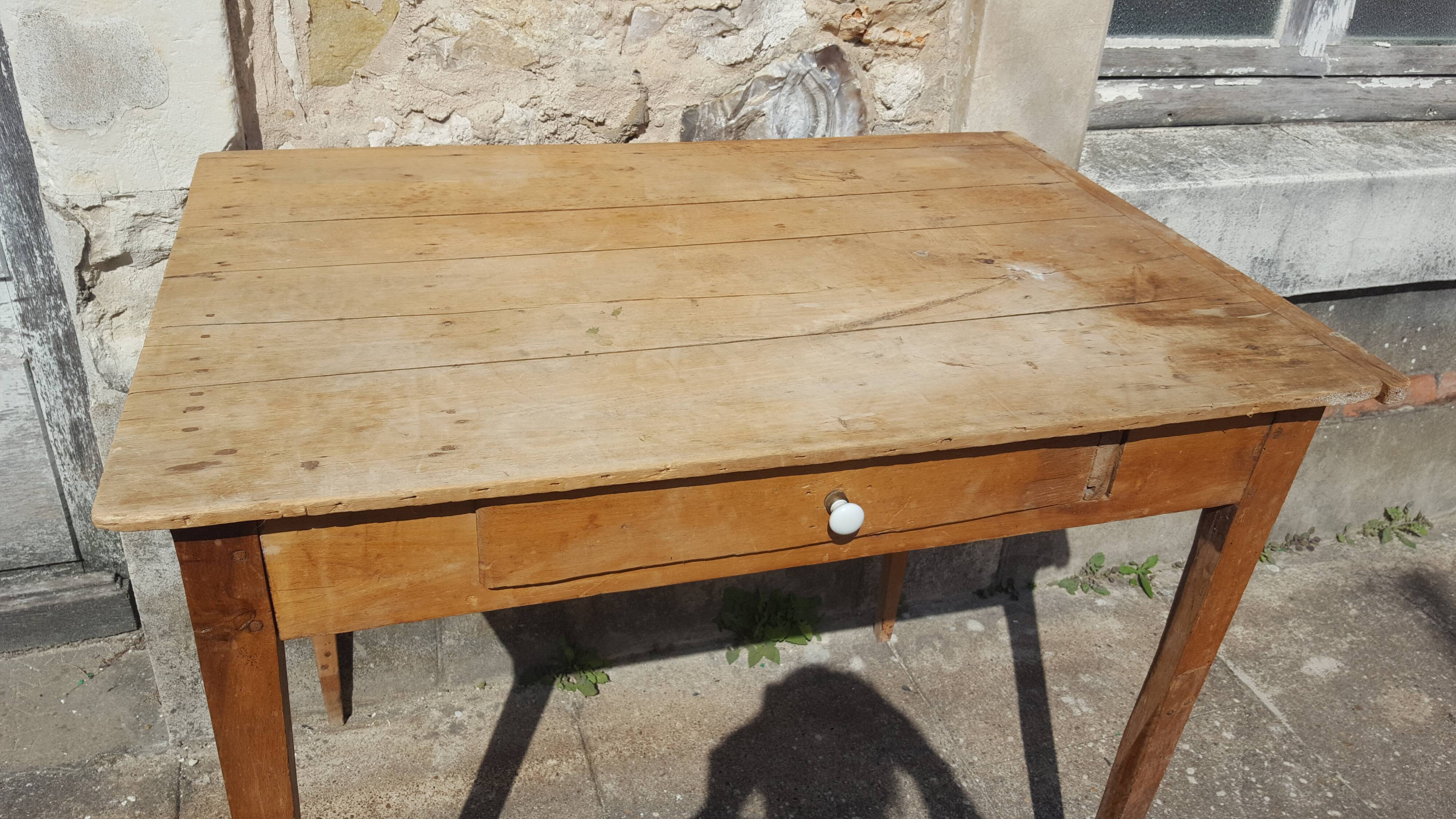 Raw wood farm table with drawer