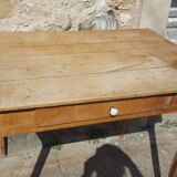 Raw wood farm table with drawer