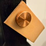 Burnt wood vase for dried flowers, leather and brass handle.