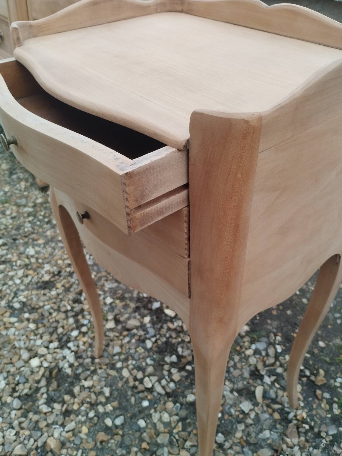 Pair of antique wooden bedside tables in Louis XV style.