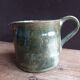 Handcrafted enameled terracotta pitcher signed