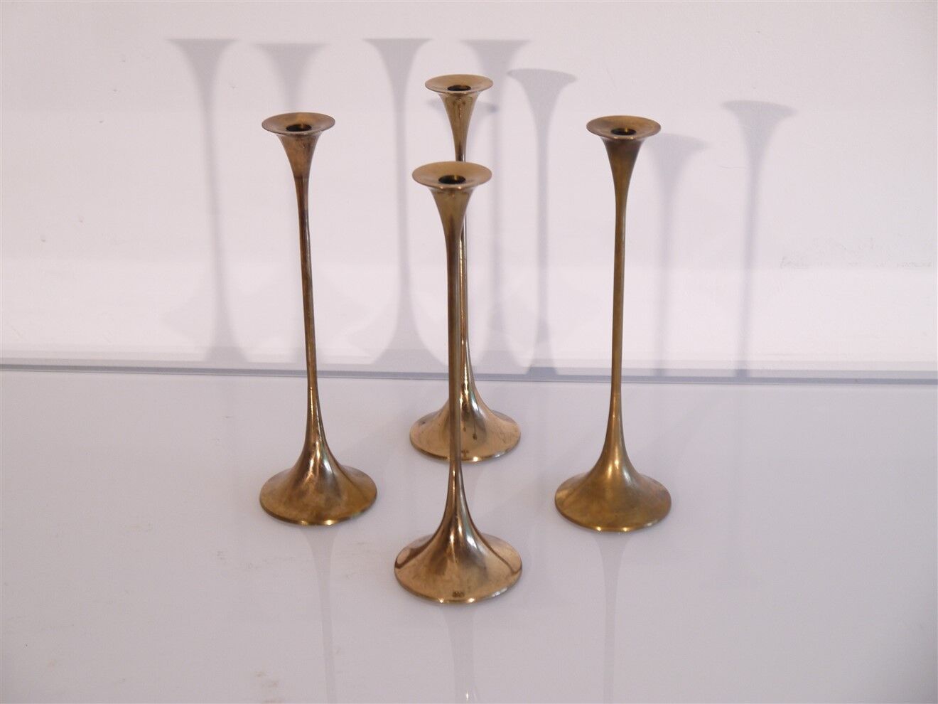 Lot of 4 Scandinavian brass candlesticks 1970