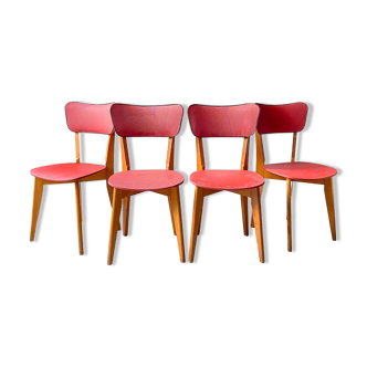 4 vintage chairs from the 60s in wood and red skai