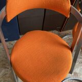 Four stainless steel armchairs from the 70s