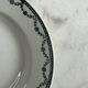 Set of two green frilled deep plates from Saint-Amand.