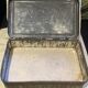 Cake tin from the early 20th century with embossed designs