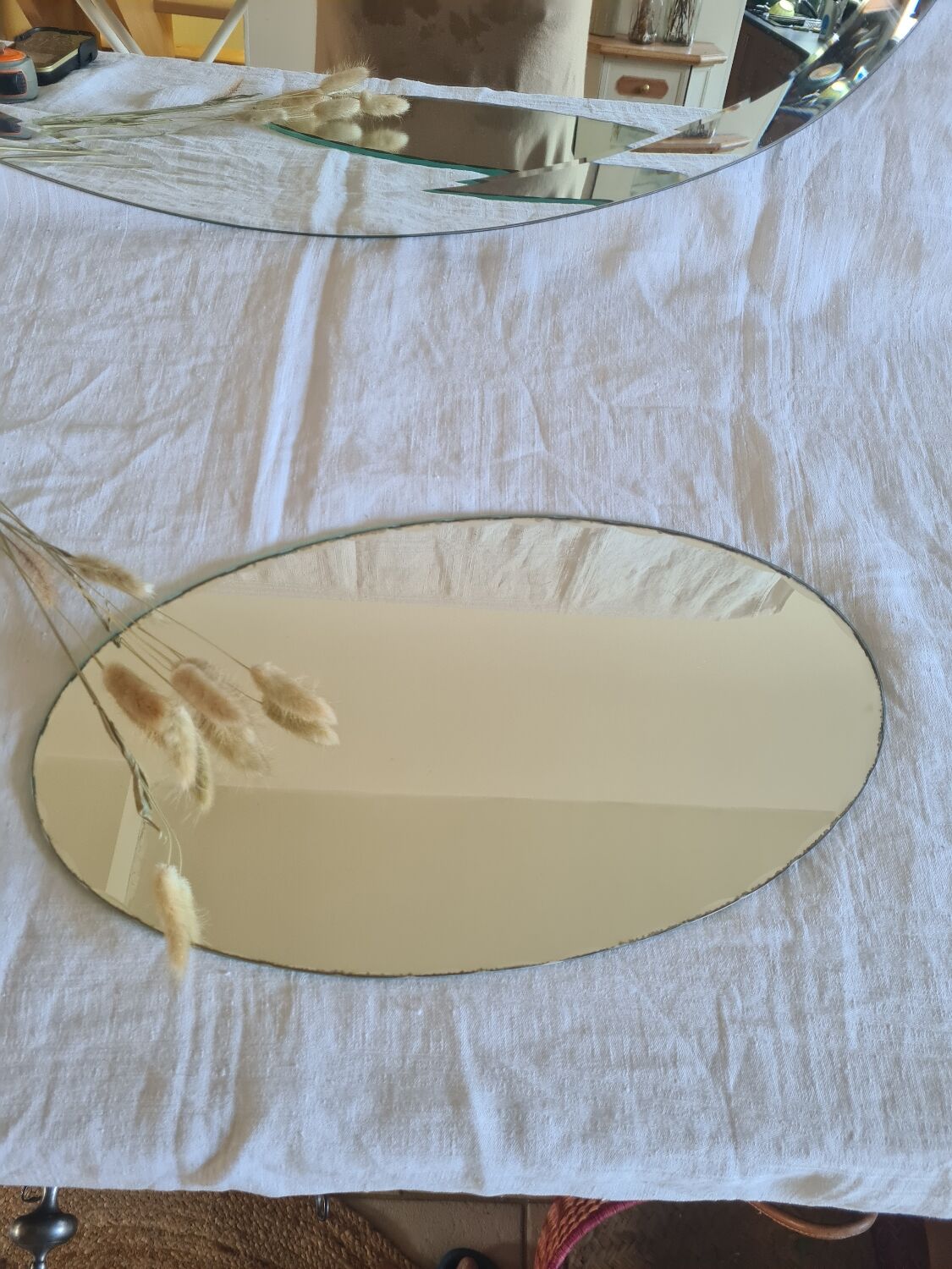 Beveled oval mirror