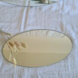 Beveled oval mirror