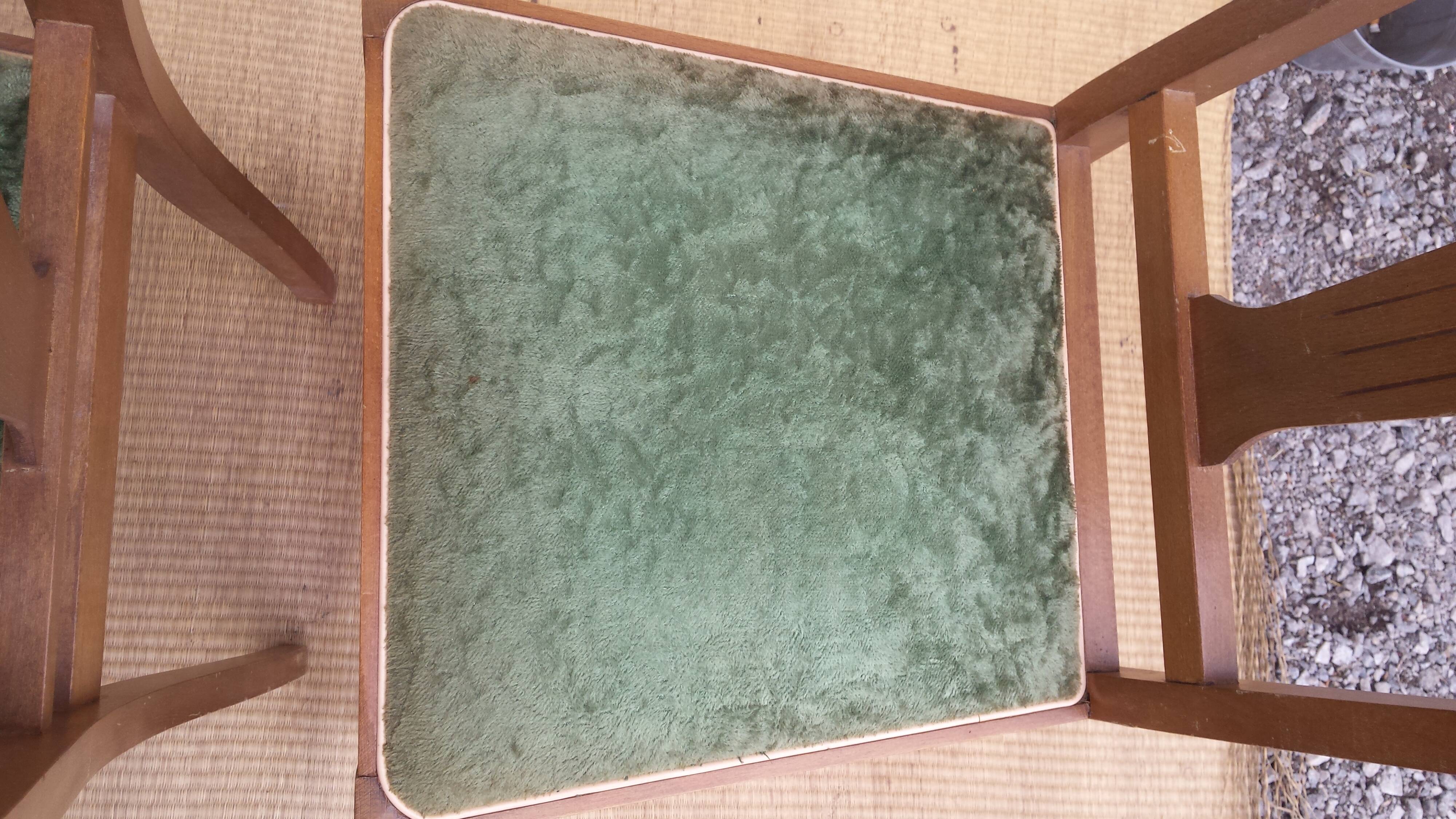 lot of 2 wooden chairs and green velvet