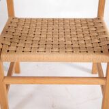 Pair of wooden and rope armchairs