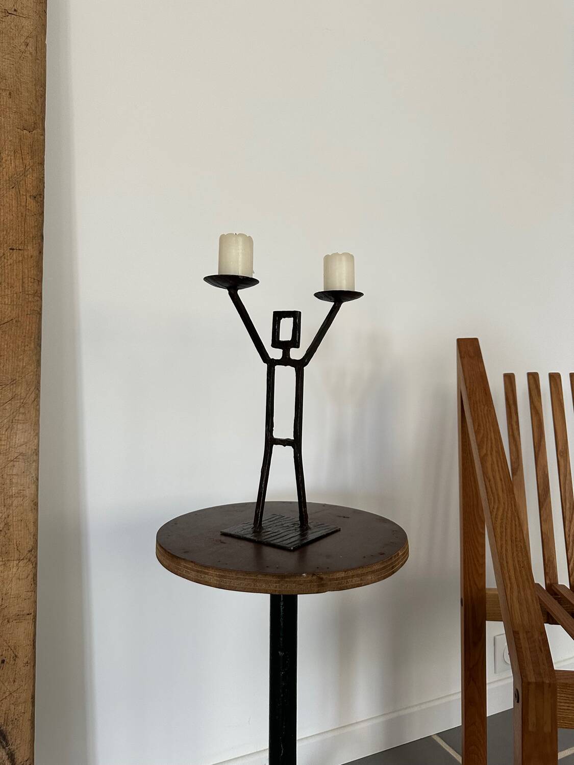 Vintage wrought iron anthropomorphic candle holder