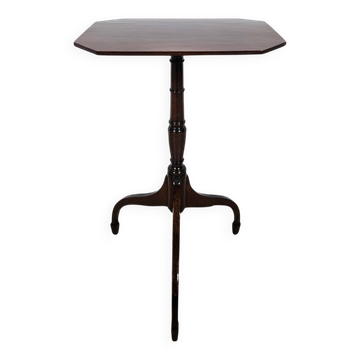 Antique octagonal mahogany side table on a classic tripod, 19th century.