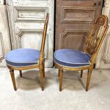 Paire de chaises style Louis XVI en bois doré