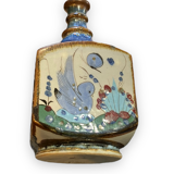 Tonala ken edwards bottle made of polychrome ceramic