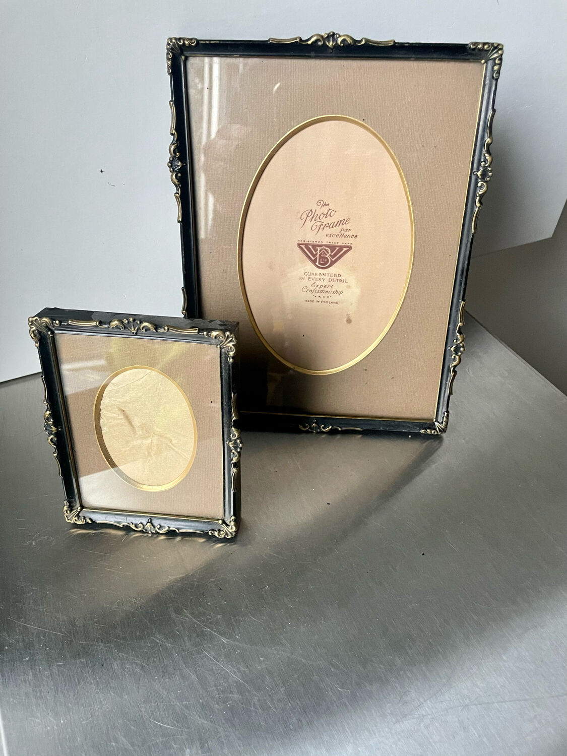 Pair of English Antique Metal Picture Frames in 2 different sizes