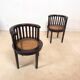 Set of 2 colonial armchairs in wood and cane.