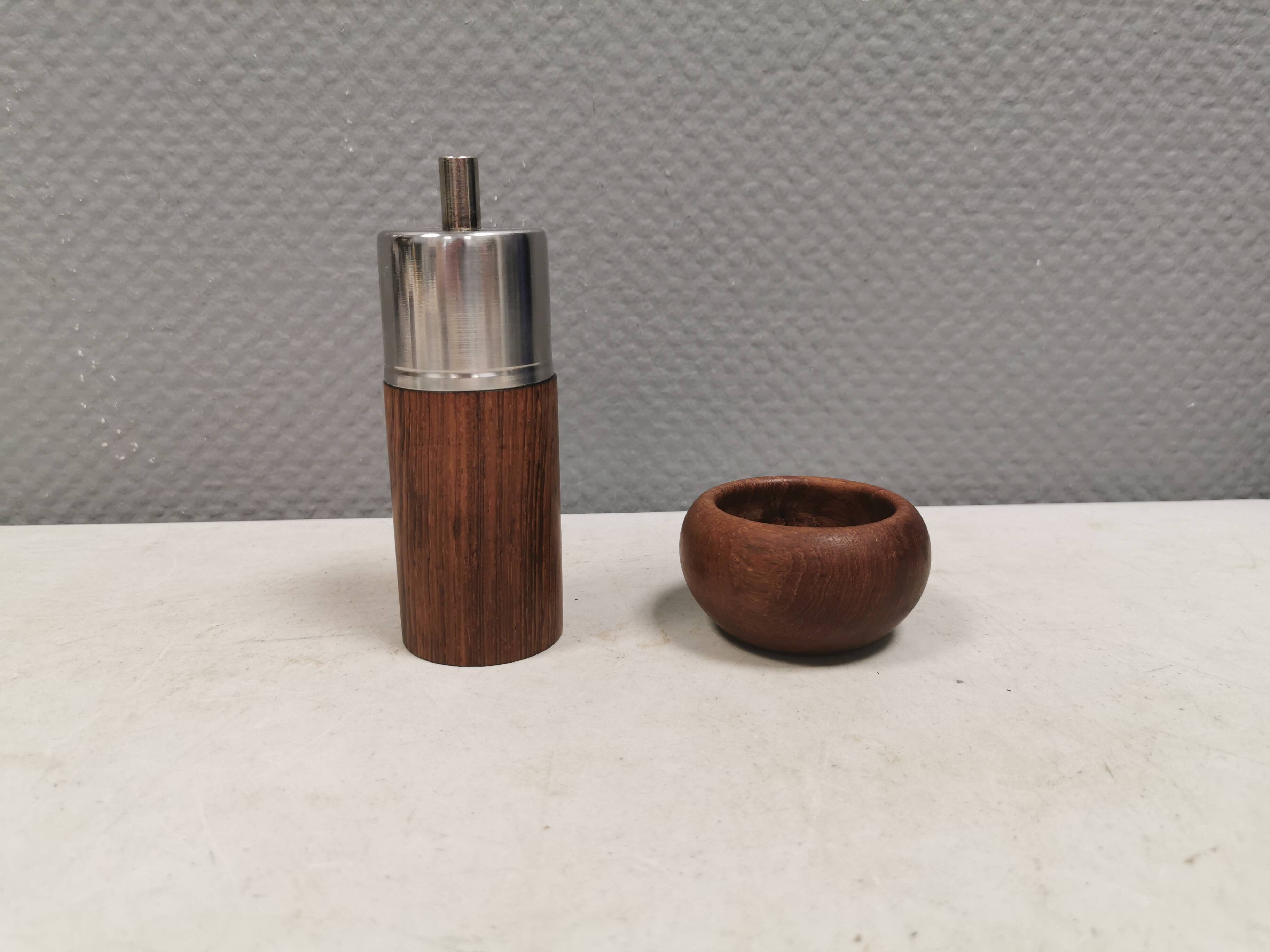 A salt shaker and a pepper mill in teak, made in Denmark 1960-70s