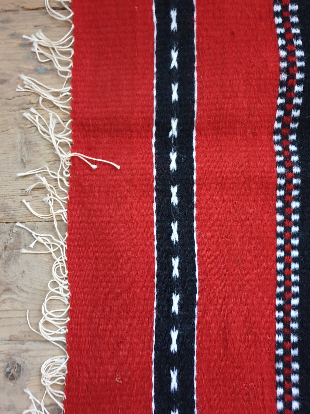 Traditional rustic red wool rug with stylized design and stripes, authentic hand-woven 160x230cm