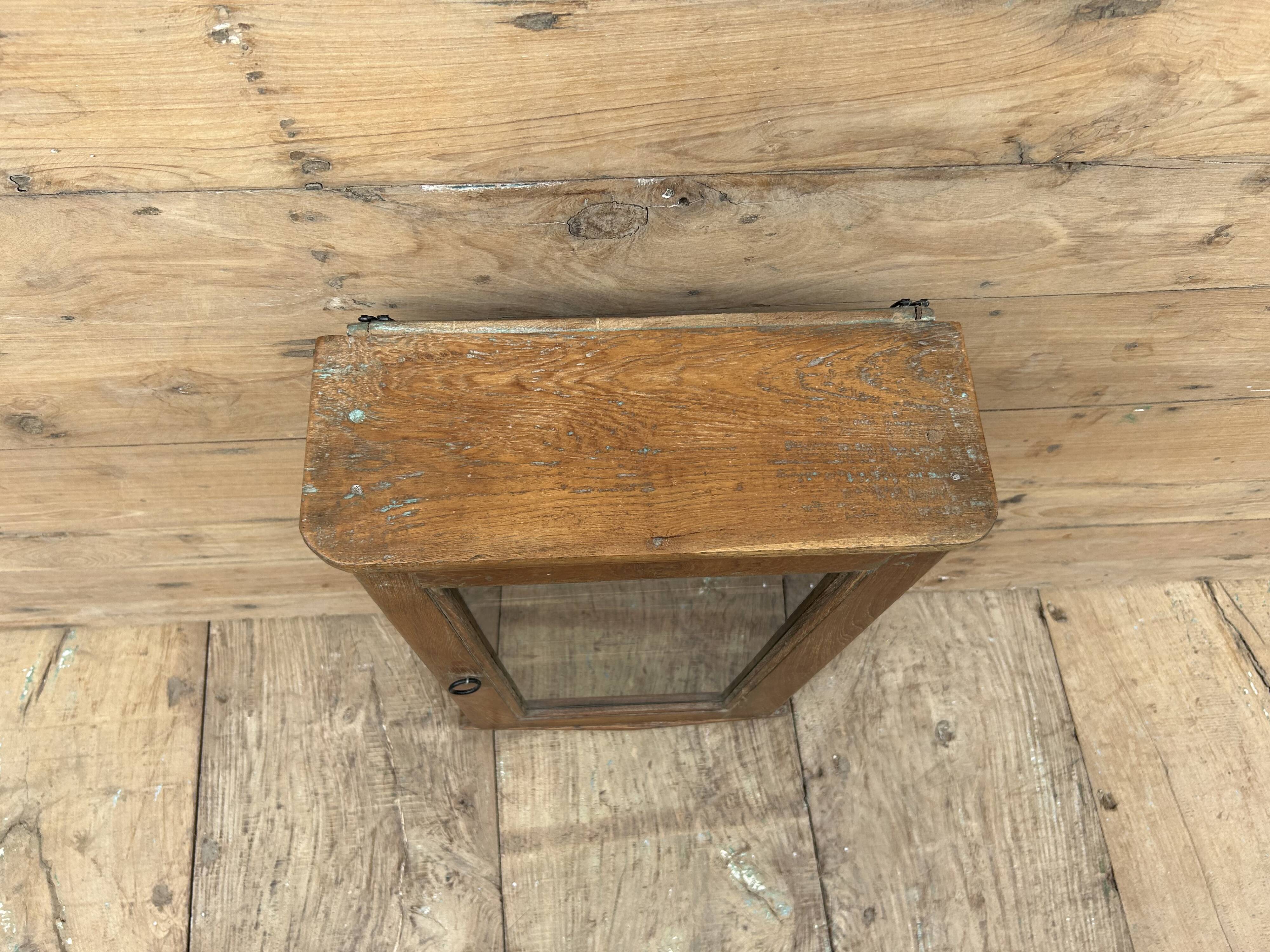 Wall display cabinet in Burmese teak