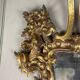 Pair of carved and gilded wooden mirrors, Italy 19th century