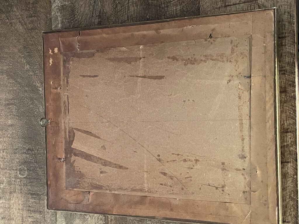 Old wood frame with a gold finish