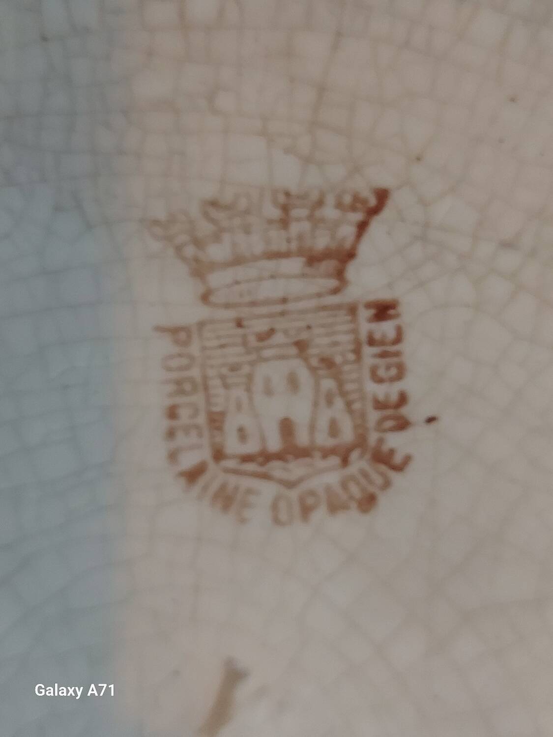 Antique opaque porcelain plate from Gien