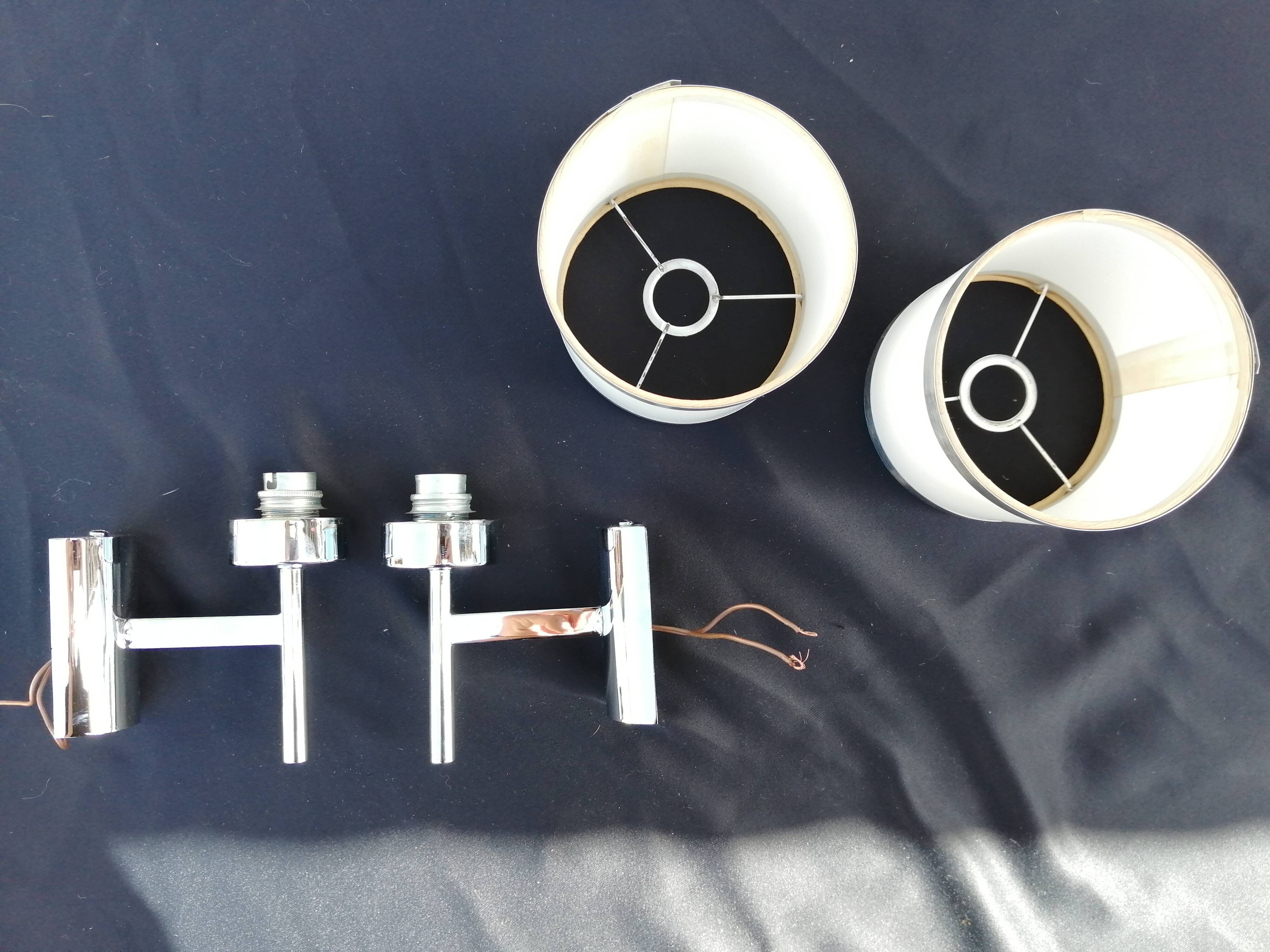 Pair of chrome design wall lights and vintage white hat 1970