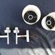 Pair of chrome design wall lights and vintage white hat 1970