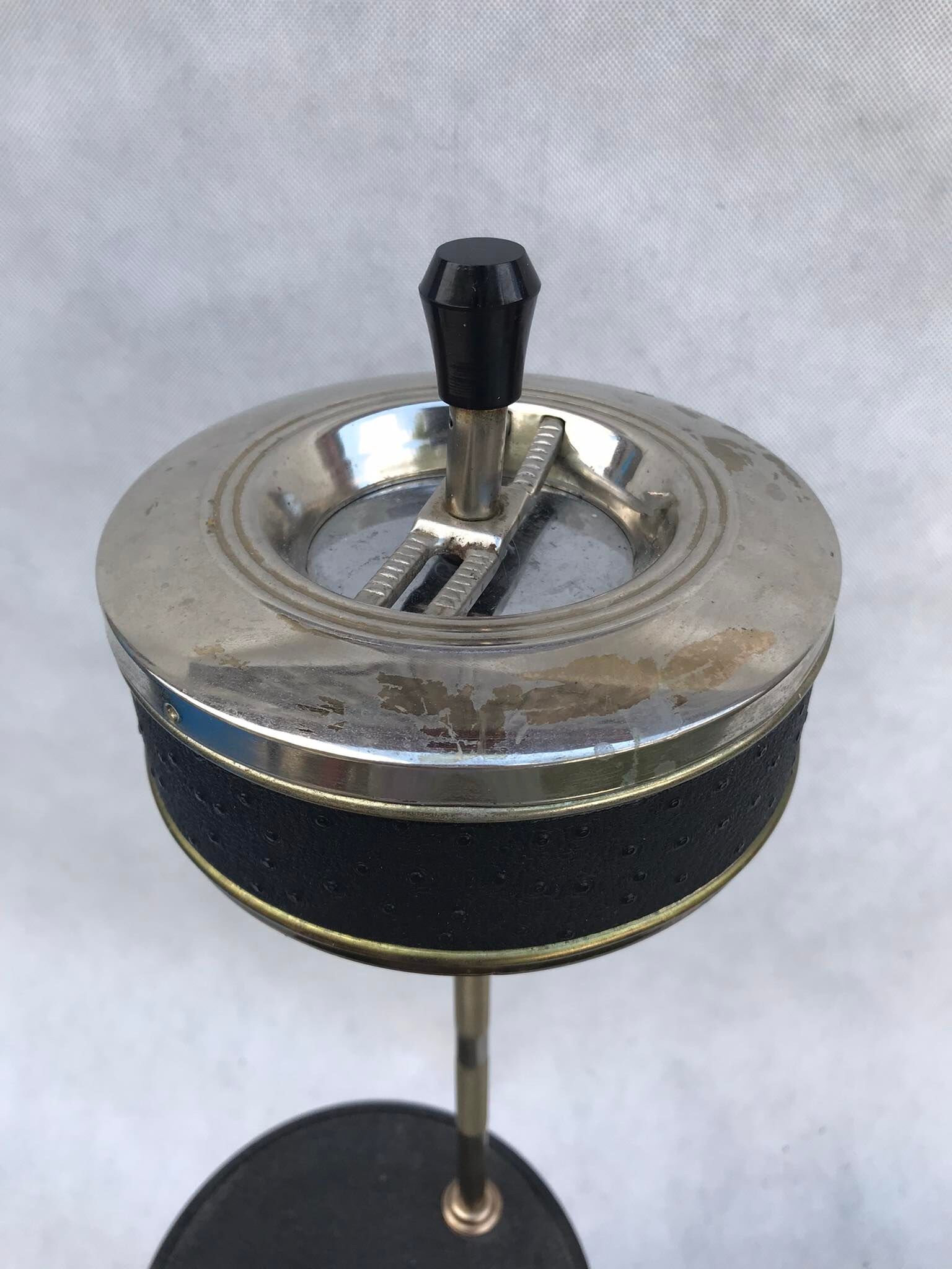 Brass ashtray on the leg from the 70's