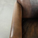 Characterful sheepskin design armchair with beautiful patina