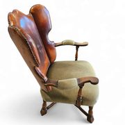 Rare leather and oak wing chair designed by Theo Ruth for Artifort / f 297 from 1949