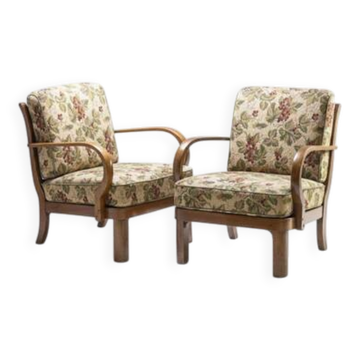 Pair of Thonet armchairs, curved wooden structure, 1940s.