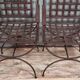 Paire de fauteuils curules en fer tréssé et laiton doré (B)