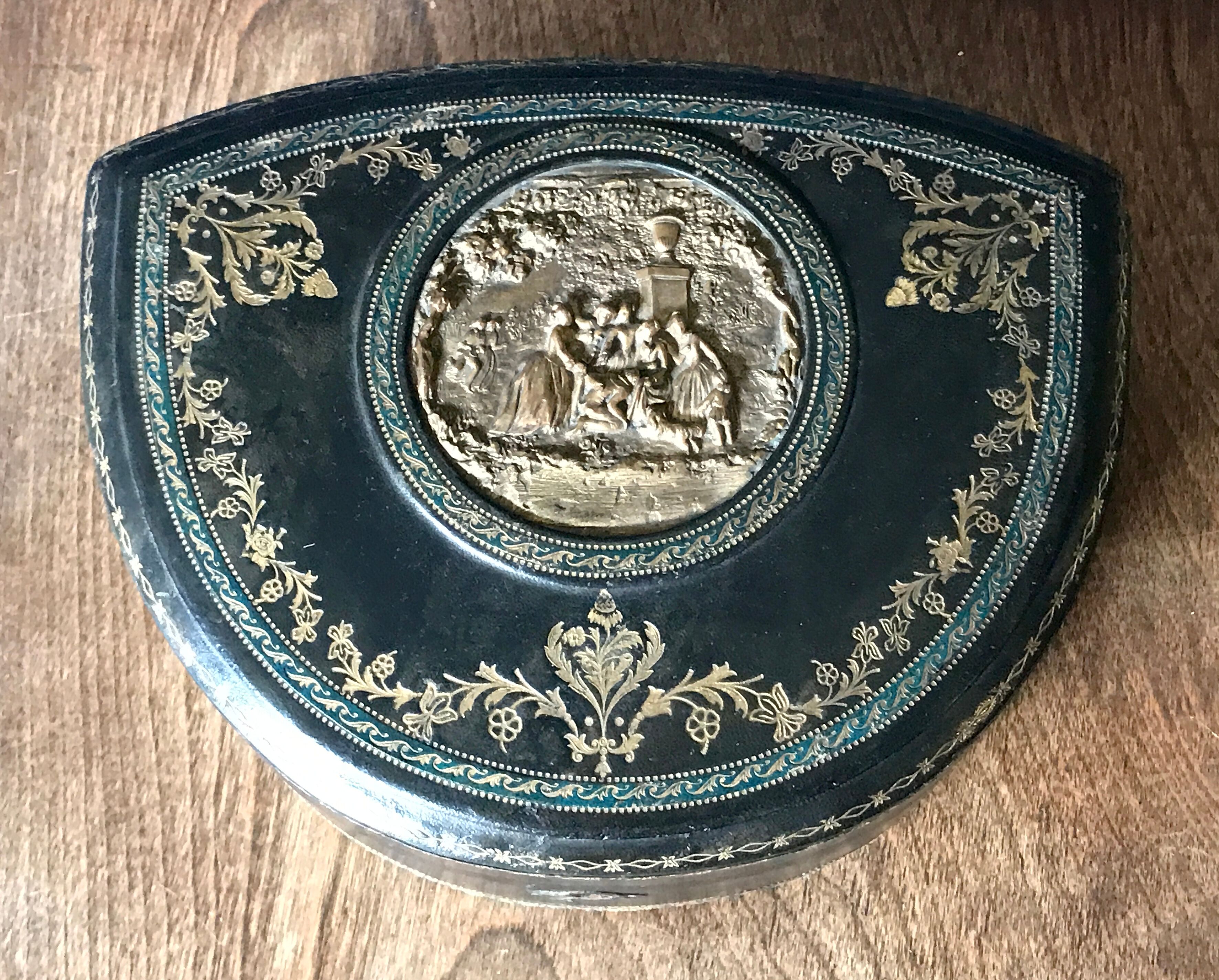 Old large leather jewelry box with a central medallion, XIX century, Napoleon III