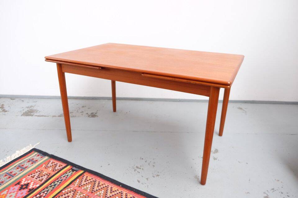 Teak dining table in retro vintage Danish style from the 60s-70s.